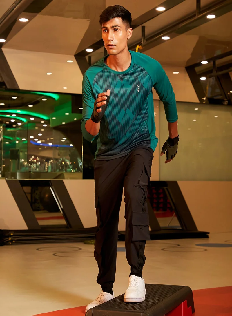 Campus Sutra Campus Sutra Men's Green Printed Dri-Fit Long Sleeve Regular Fit Activewear T-Shirt For Casual Wear | Modern Clothing T-Shirt Crafted With Comfort Fit And High-Performance For Everyday Wear