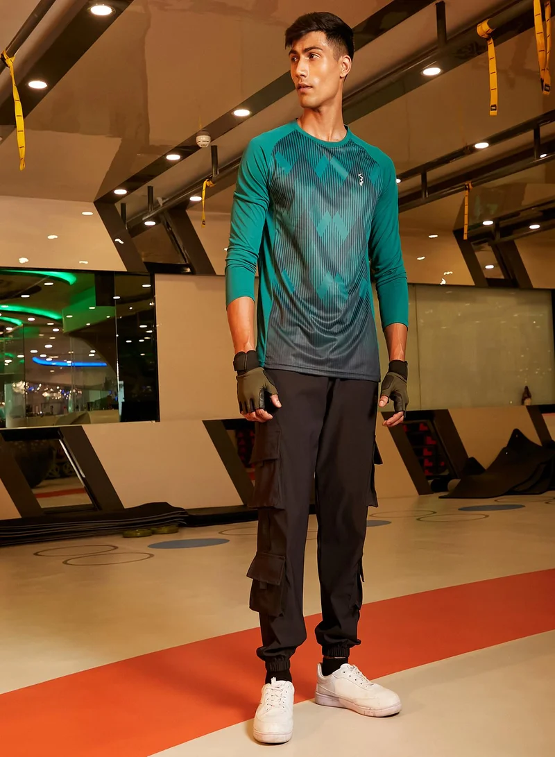 Campus Sutra Campus Sutra Men's Green Printed Dri-Fit Long Sleeve Regular Fit Activewear T-Shirt For Casual Wear | Modern Clothing T-Shirt Crafted With Comfort Fit And High-Performance For Everyday Wear