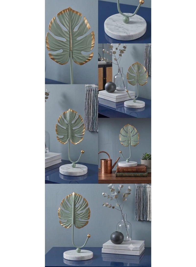 Metal jewelry and key holder with a monstera leaf design - pastel green with gold trim and a round marble base - modern table decoration - Image 3