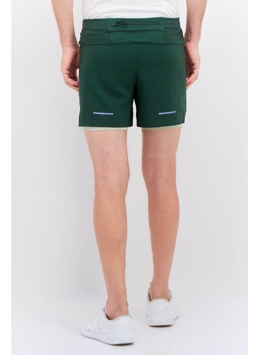 Men Sportswear Fit Brand Logo Running Shorts, Green - pzsku/Z1717D9C886DFD5A6537FZ/45/_/1737642988/0b57bd48-1fcc-471a-a0ce-26d593fa8bc8