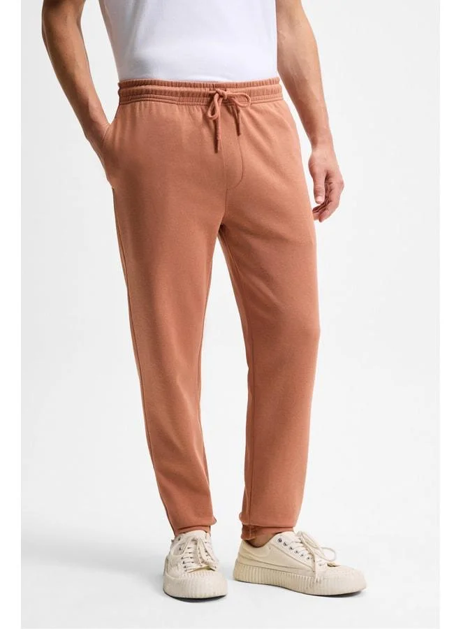 Grimelange OLSEN Men's Belted Corded Pants with Side Pockets, Back Decorative Flap, Relaxed Fit, Tile Color, Chinos.