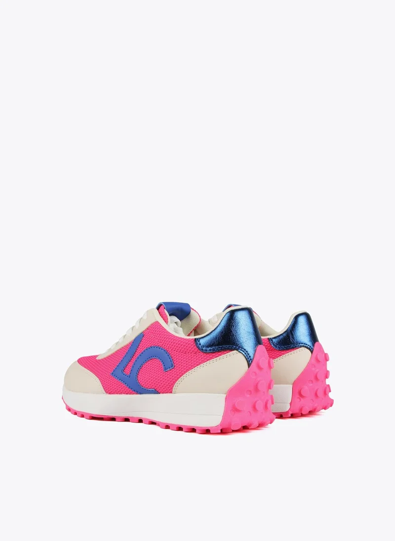 Lola Casademunt Blue and neon pink sneakers