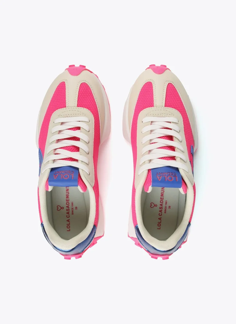 Lola Casademunt Blue and neon pink sneakers