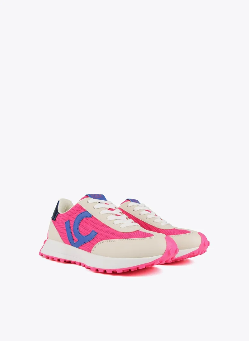 Lola Casademunt Blue and neon pink sneakers