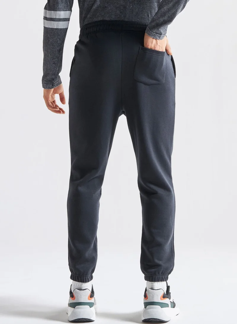 FAV Drawstring Cuffed Sweatpants