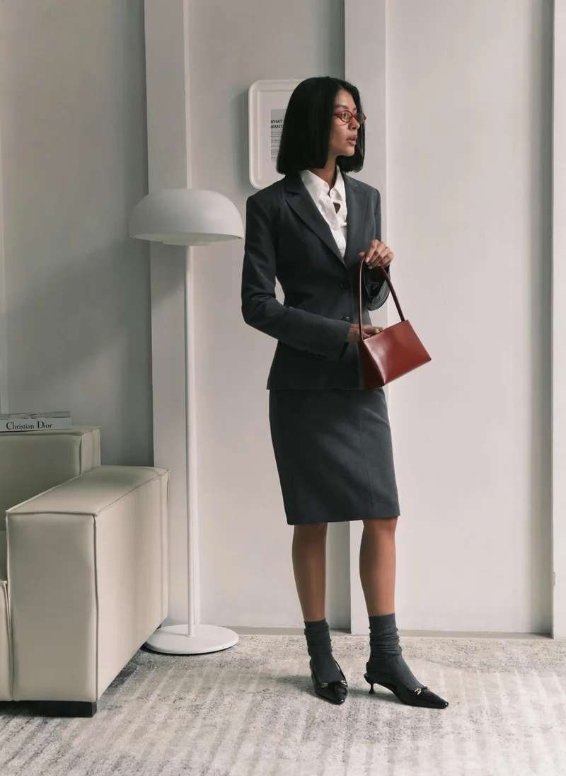 Lichi Knee-length mini skirt with imitation side pockets and a belt