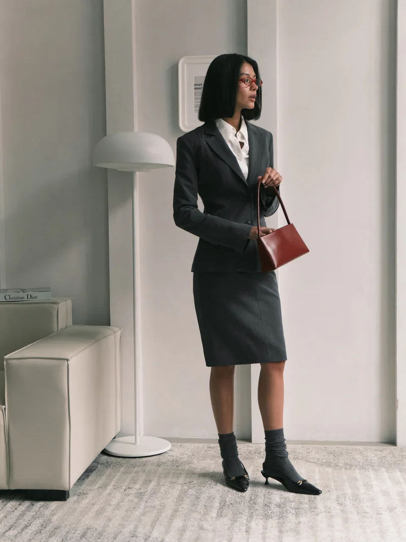 Lichi  Knee-length mini skirt with imitation side pockets and a belt for Women | Best Price UAE