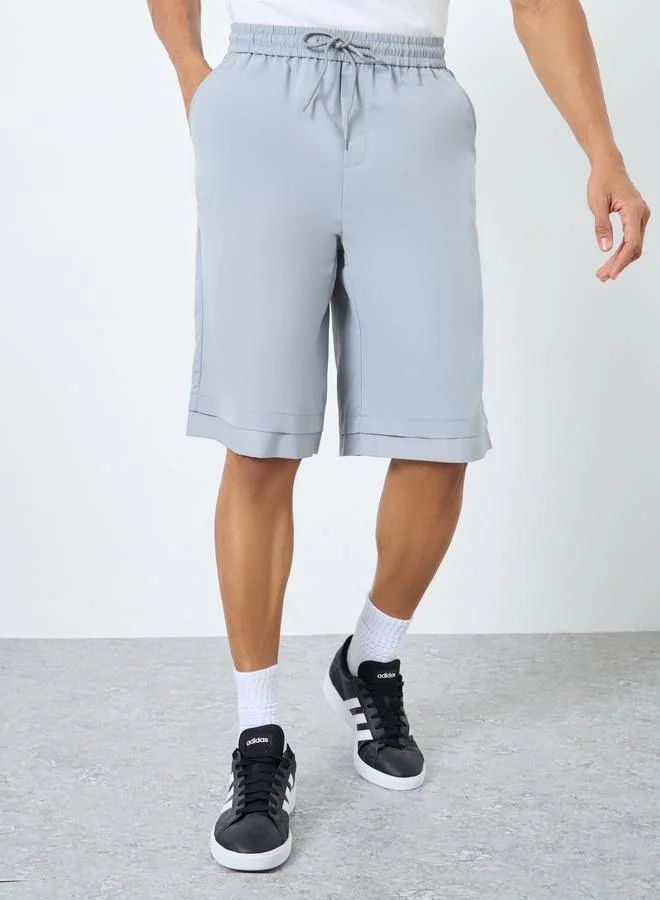 ستايلي Styli Men Grey Oversized Solid Shorts with Drawstring