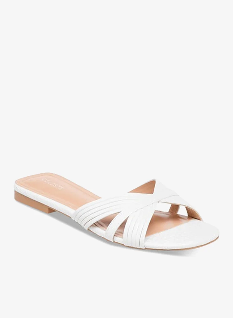 سيليست صنادل نسائية مسطحة سهلة الارتداء بتصميم متقاطع