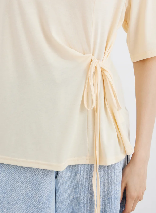 تايك تو Take Two Solid Round Neck Tie Up Detail Wrap Top