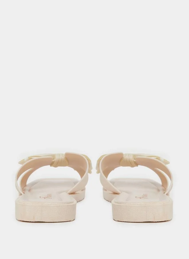 تايك تو صندل مسطح بتفاصيل فيونكة صلبة