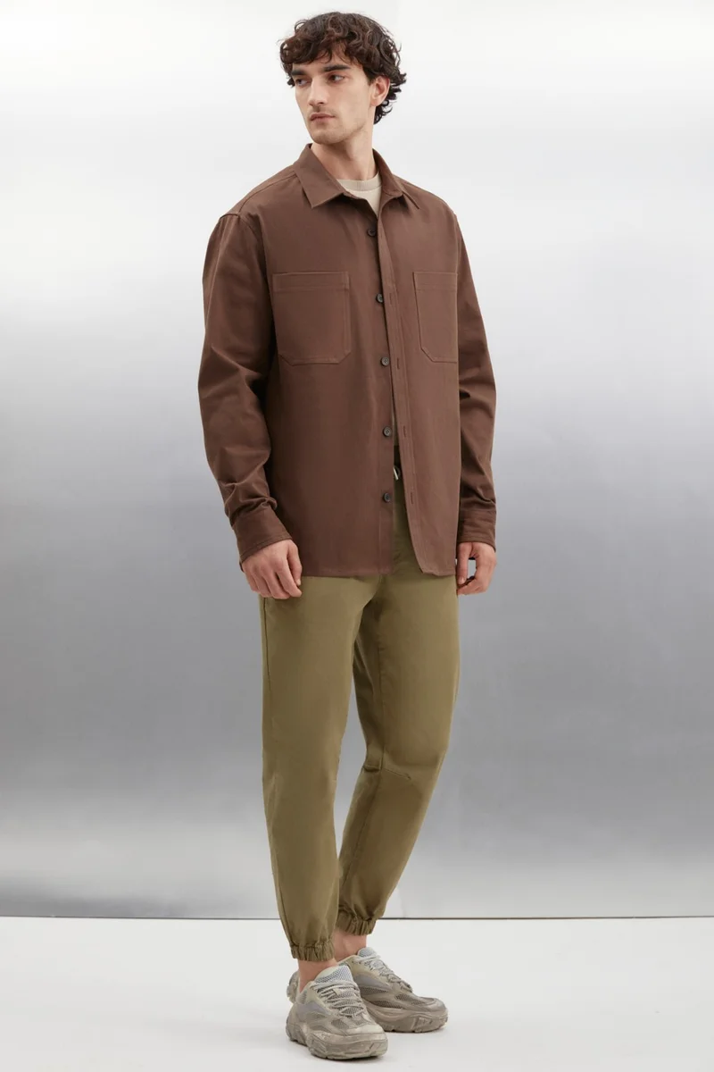 GRIMELANGE Jakob Men's Woven Washed 4 Pocket Thick Textured Elastic Leg Khaki Trousers
