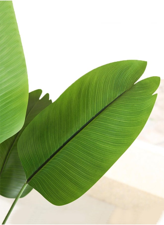 Artificial Bird of Paradise Plant: A faux palm tree perfect for indoor or outdoor modern decoration. It comes in a pot, making it an ideal housewarming gift for home or office. - https://f.nooncdn.com/p/pzsku/Z173FE3B6719612E5C937Z/45/_/1705288804/36722f07-1c2b-4f3a-9699-d6d9cf78ee7f.jpg?width=original