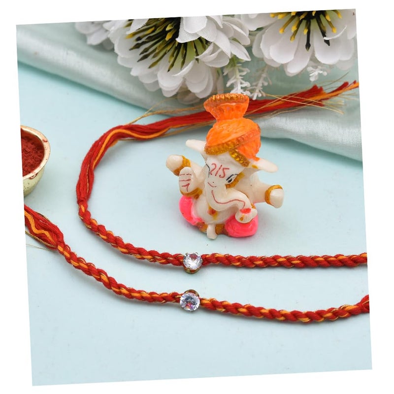 Evisha 2 pcs Simple Elegant Moli Thread with Stone Rakhi with Ganesh Murti for Brother Men Bhaiya R-64-Two Rakhi with Roli Chawal Packet Rakhi for bhai - Image 1