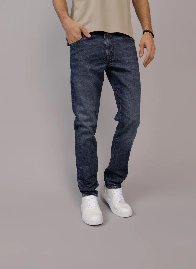 امريكان ايجل Light Wash Slim Fit Jeans
