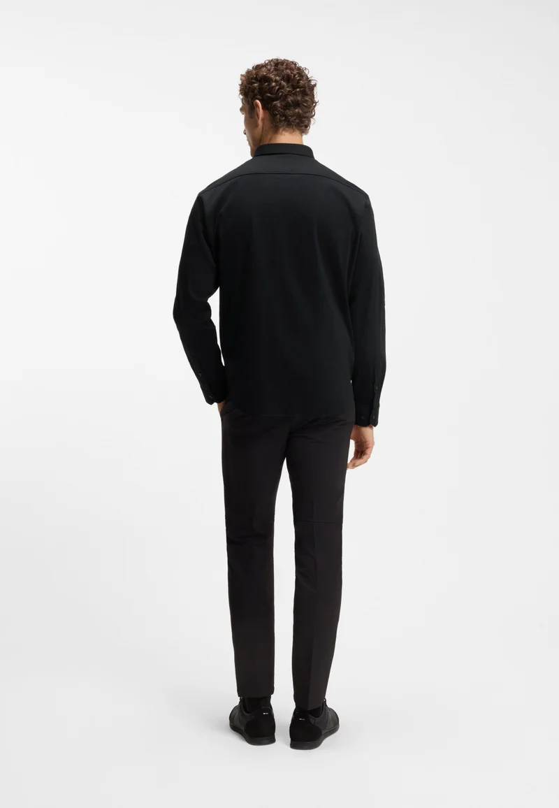 بوس قميص بقصة عادية من قطن جيرسي مقاوم للتجعد