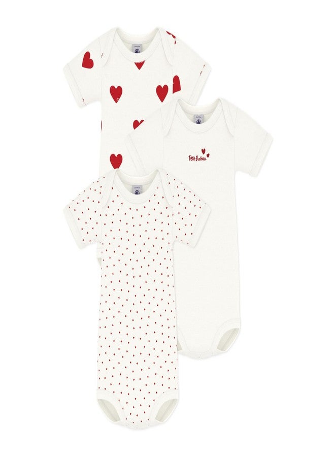 Petit Bateau بدلات أطفال بنات قصيرة الأكمام بنمط قلب من قطن عضوي - عبوة 3 قطع نمط A00BB مقاسات 1-36 شهر ... (مقاس 18 شهر نمط A00BB) - Image 1