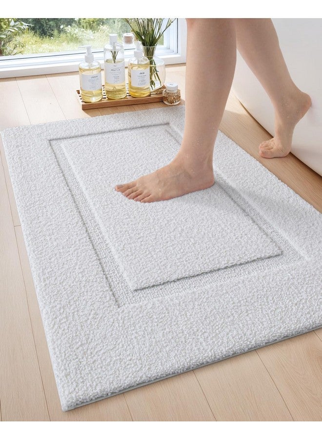 DEXI Bathroom Rugs 32x20, Washable Non Slip Bath Mat for Shower Floor, Absorbent Quick Dry Bathmat with Rubber Backing, Ultra Soft Plush Carpet for Tub, White - Image 1