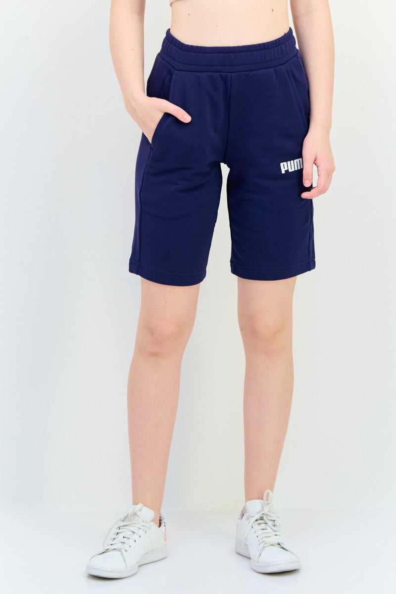 PUMA Men Sportswear Fit Brand Logo 10 Inseam Outdoor Shorts, Navy - Image 1