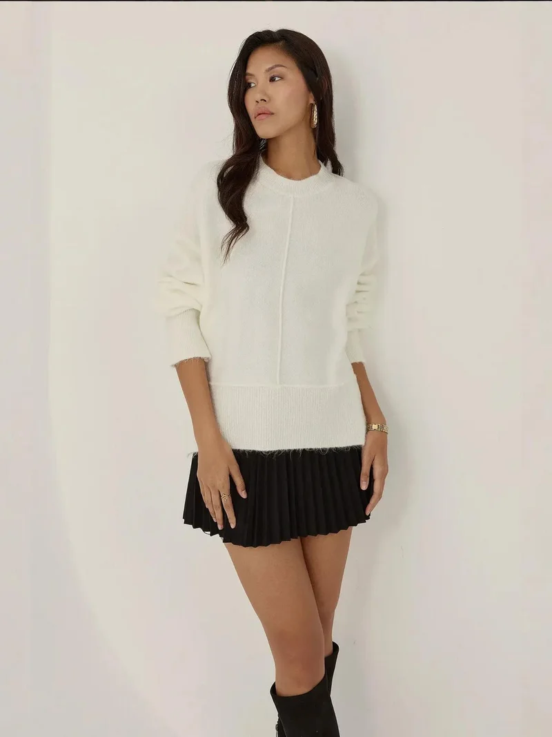 زوبعة كنزة محبوكة بقصة مريحة