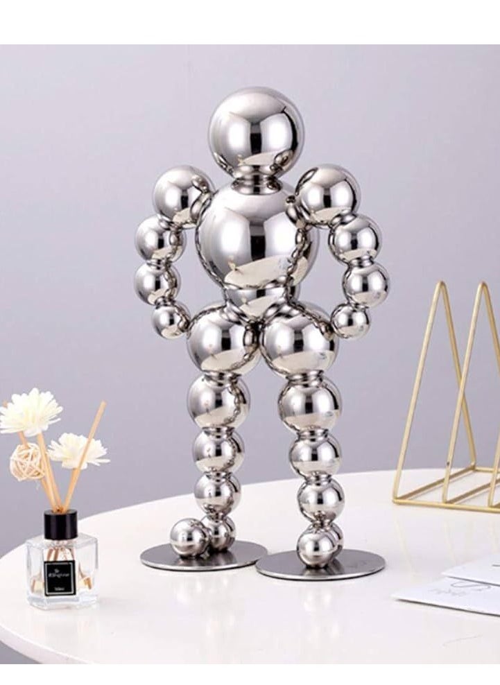 Golden Spherical Man Statue - A Modern Artwork That Attracts Eyes