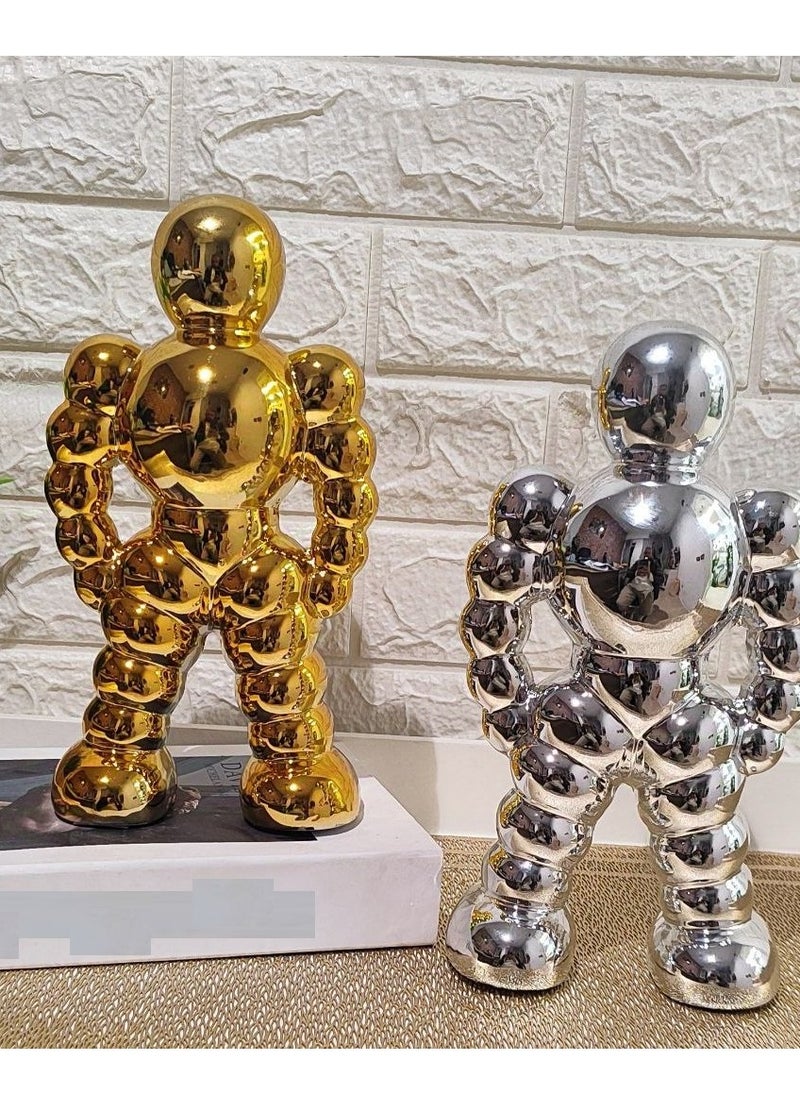 Golden Spherical Man Statue - A Modern Artwork That Attracts Eyes