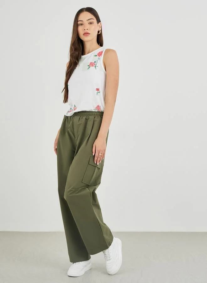 تايك تو تيشيرت بدون أكمام بطبعة زهور تيك تو