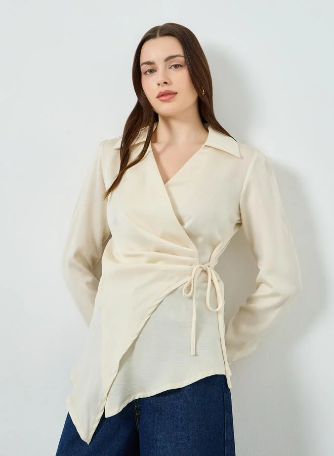 ستايلي بلوزة بيج بنمط ملفوف وربطة