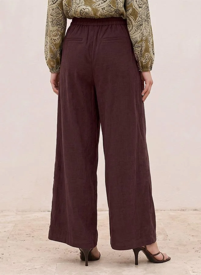 Iconic BROWN Iconic Straight Fit Elastic Waist Textured Pants for Women | Best Price UAE