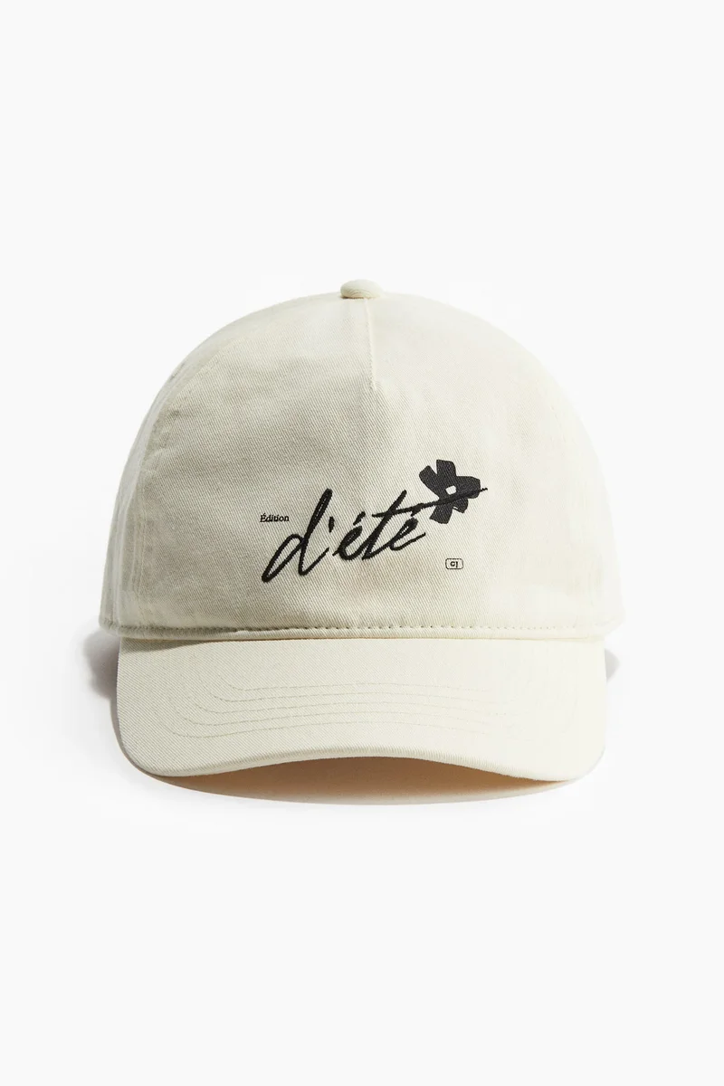 اتش اند ام قبعة قطنية برسومات مُطرزة