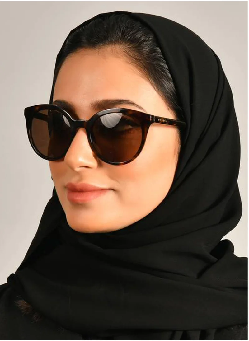 HAWRAA ABAYA A plain black veil without any prominent details