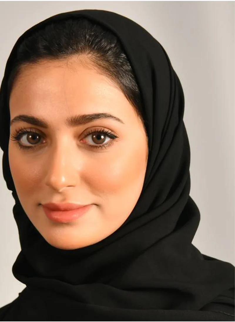 HAWRAA ABAYA A plain black veil without any prominent details
