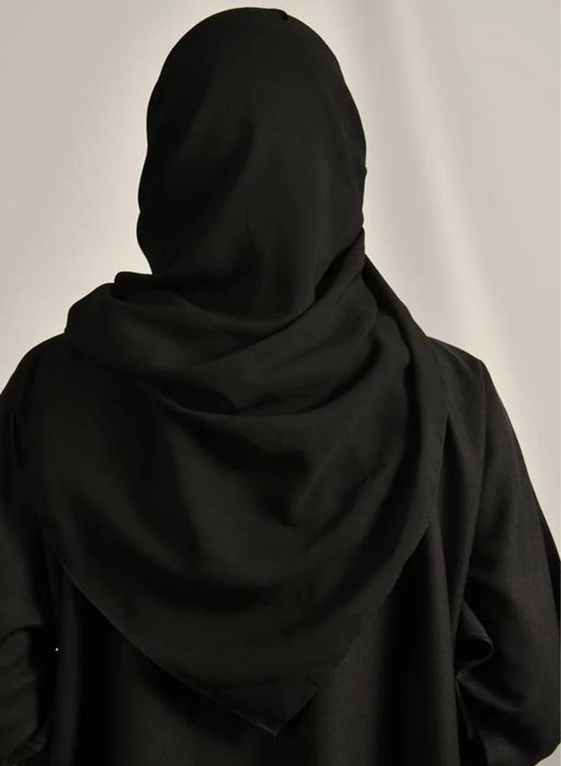 HAWRAA ABAYA A plain black veil without any prominent details