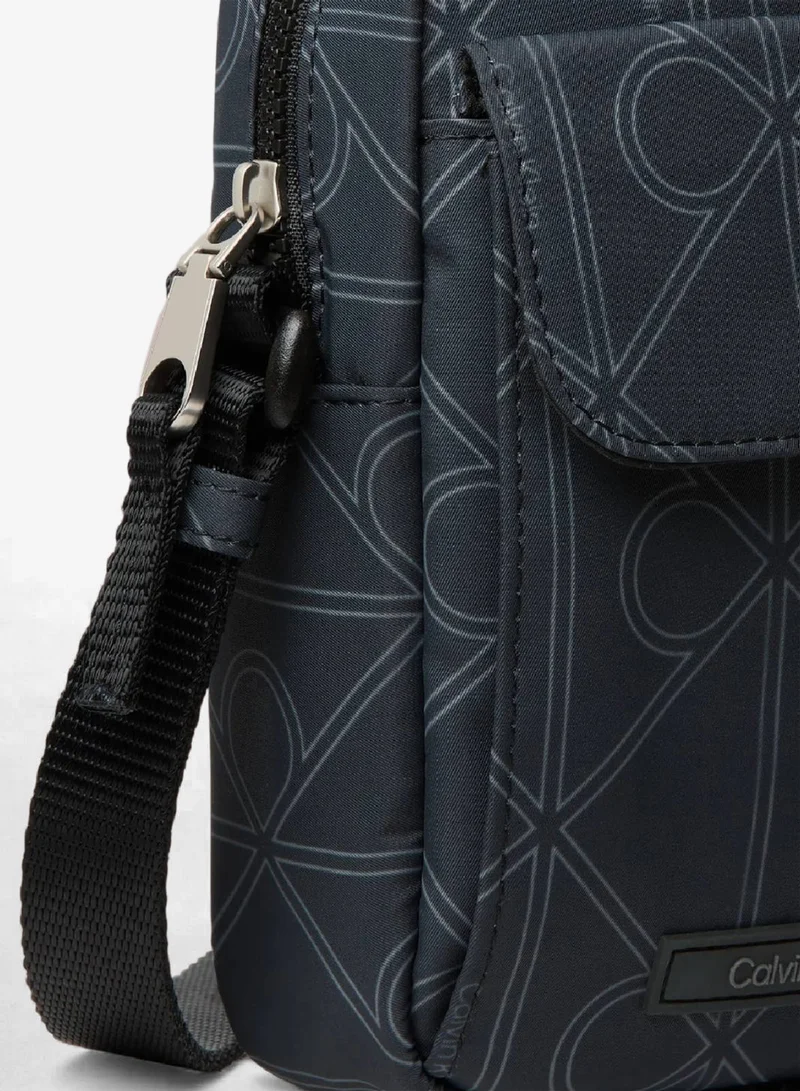 Calvin Klein Pirate Black Printed Logo Reporter Bag for Men | Best Price UAE