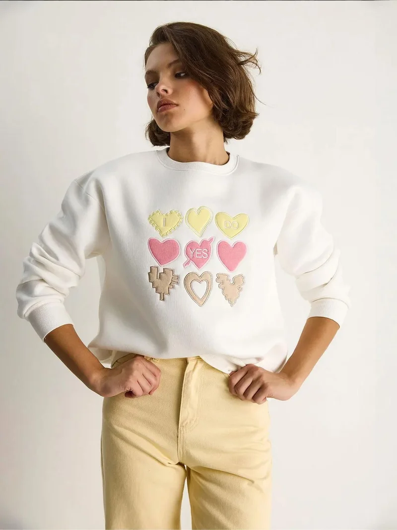 Bianco Lucci Heart Patch Appliqué Relaxed Fit Crew Neck Sweatshirt