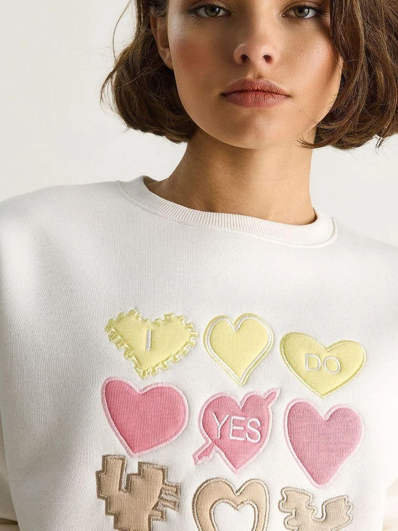 Bianco Lucci Heart Patch Appliqué Relaxed Fit Crew Neck Sweatshirt