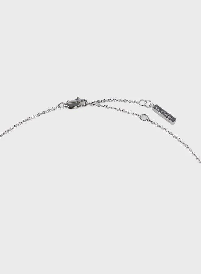Calvin Klein  Warped Rings Collection Necklace For Women In Stainless Steel With A Charm - 35000008 for Women | Best Price UAE