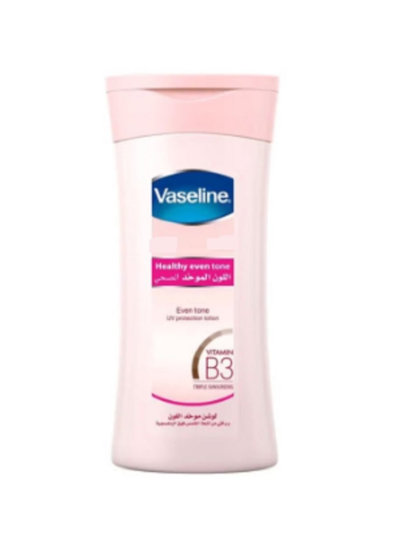 فازلين لوشن صحي للجسم بفيتامين B3 ثلاثي للحماية من الشمس للحماية من الأشعة فوق البنفسجية، 400 مل - Image 1