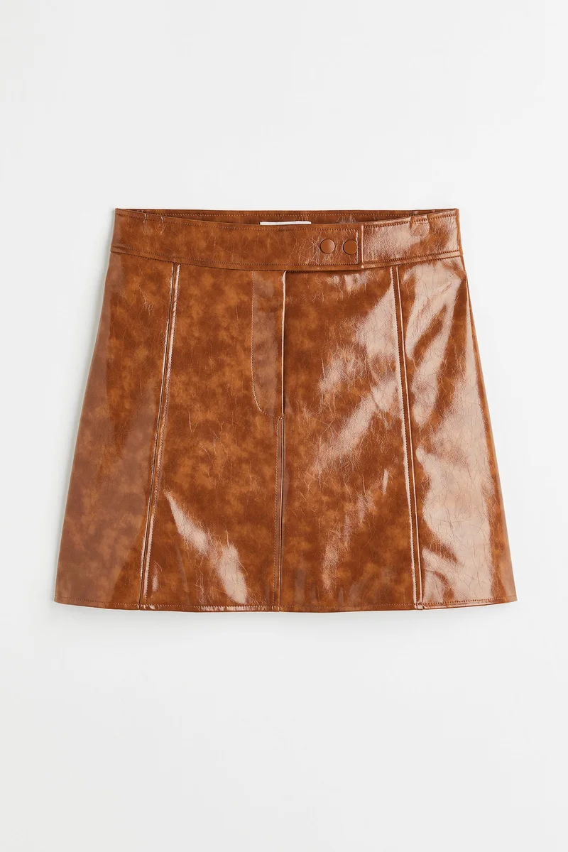 اتش اند ام تنورة منقوشة