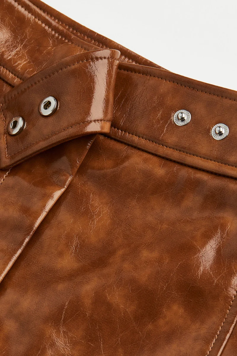 اتش اند ام تنورة منقوشة