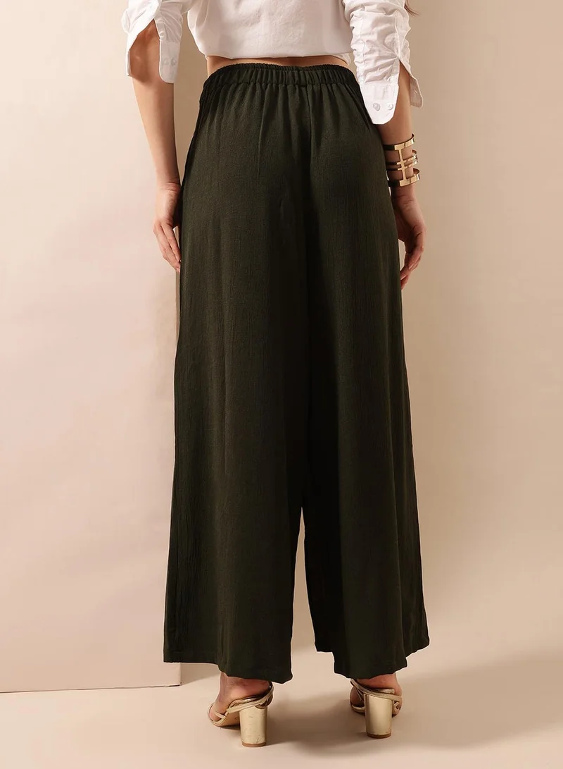 Ishin  Olive Poly Solid Print Full Length Palazzo Flared Trouser For Women for Women | Best Price UAE
