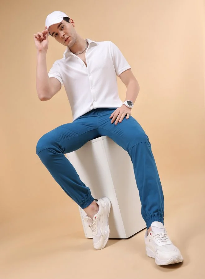 شركة المرآب الهندية Men Slim Fit Solid Mid-Rise Elasticated Linen Jogger Trouser