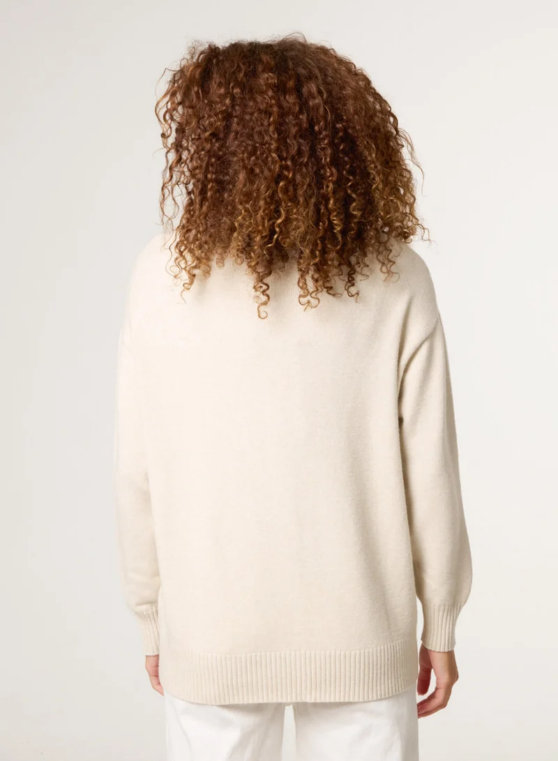 بلو فانيلا كنزة بتفاصيل غرزة الأرجيل