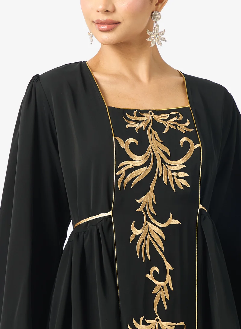 هيا كلوزيت فستان بأكمام منفوشة وتفاصيل أزرار