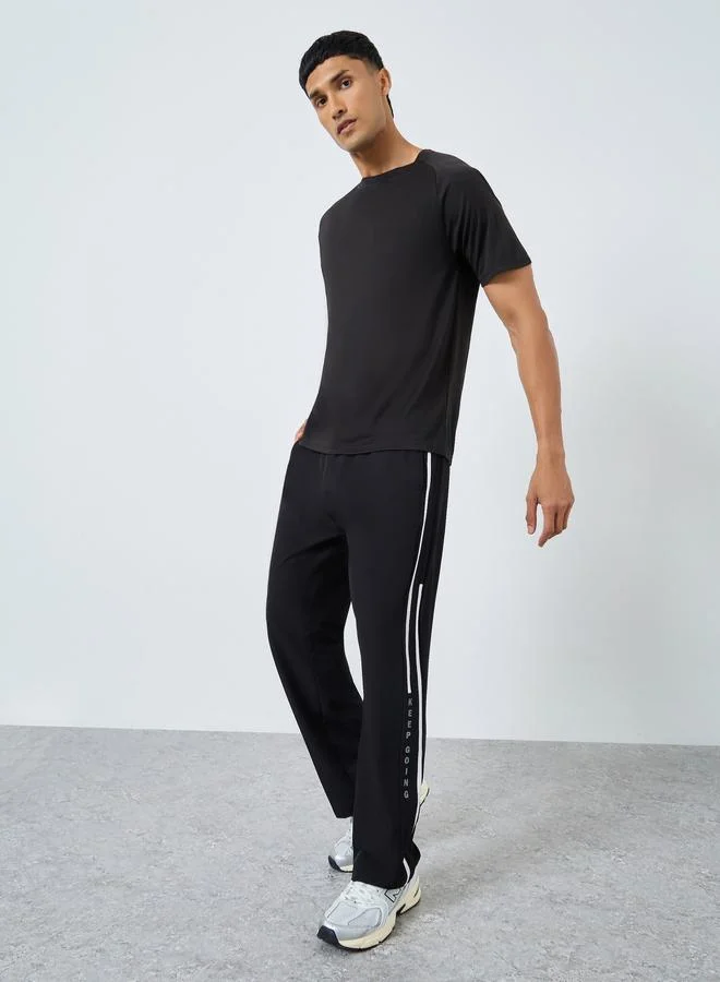 Styli Active Athleisure Track Pants With Side Panel and Print Detail