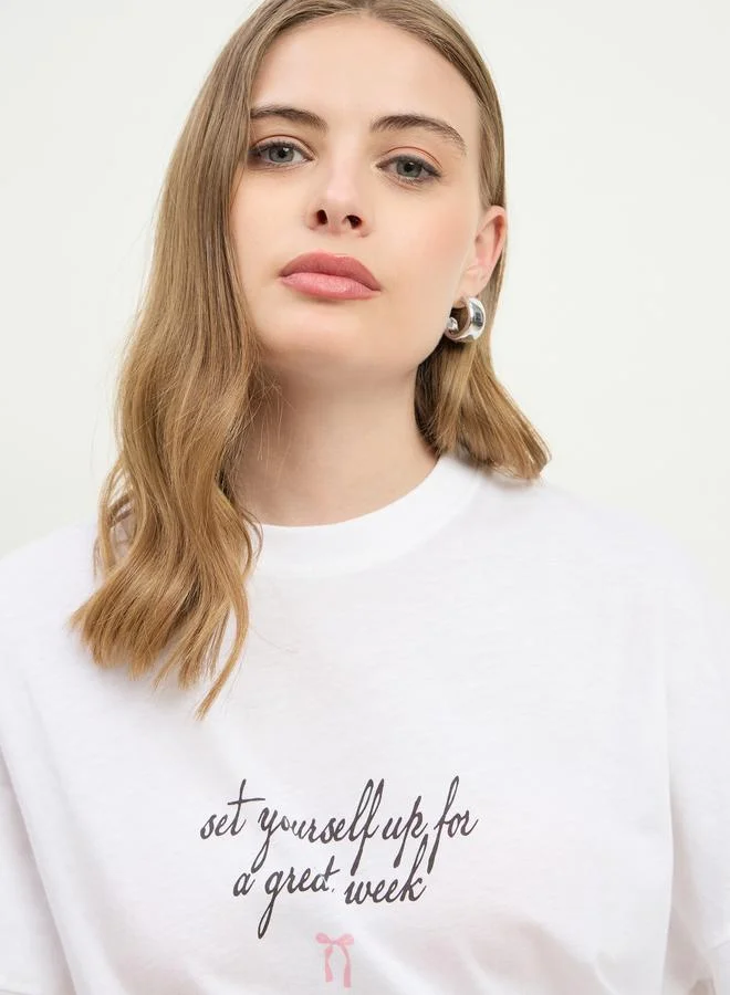 Styli Women White Slogan Print Exaggerated Shoulder Oversized T-Shirt