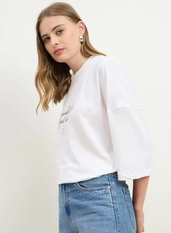 Styli Women White Slogan Print Exaggerated Shoulder Oversized T-Shirt