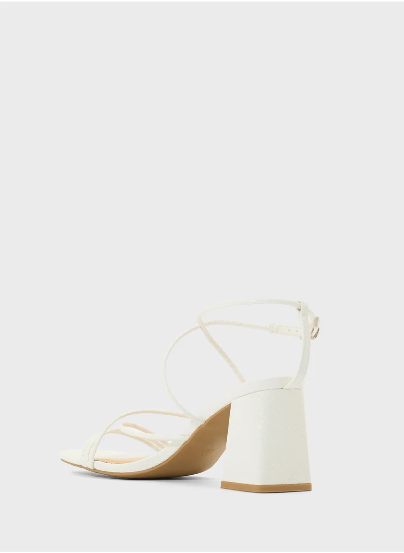 ترافل من نمشي Flaire Block Heel Multi Strap Ankle Strap Block Heel Sandal