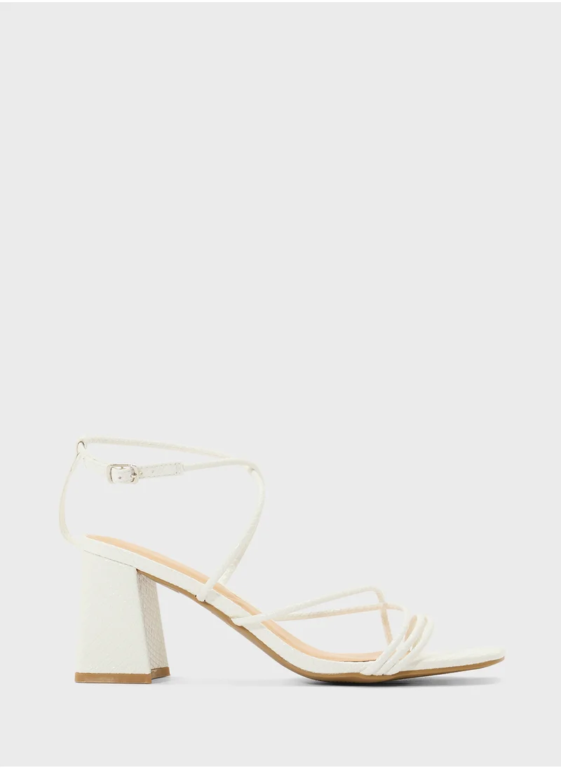 ترافل من نمشي Flaire Block Heel Multi Strap Ankle Strap Block Heel Sandal