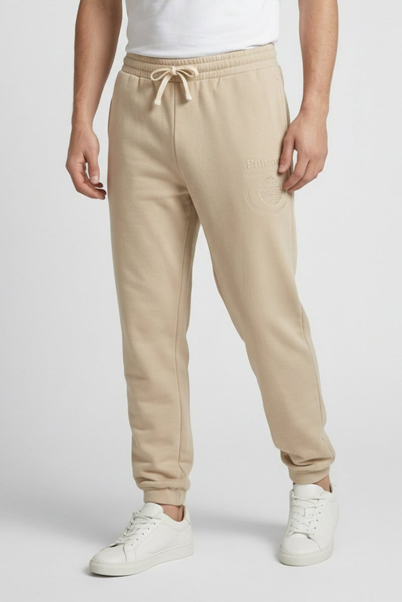 Fudo Men Regular Fit Brand Logo Jogger Pants, Beige - Image 1